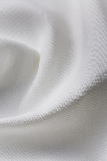ART. 43836 | Weft stretch, piece dyed, with weft face twill weave (1/2) structure, dense and supple, very fine slubs, FSC Viscose. Min. for sampling 50m/col, for production 300m/col, stock service dependng on availability.