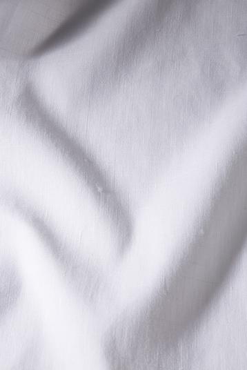 GRAVINA | Coll Ospiti del Mondo. Solid color piece dyed weft stretch fabric with plain weave structure.