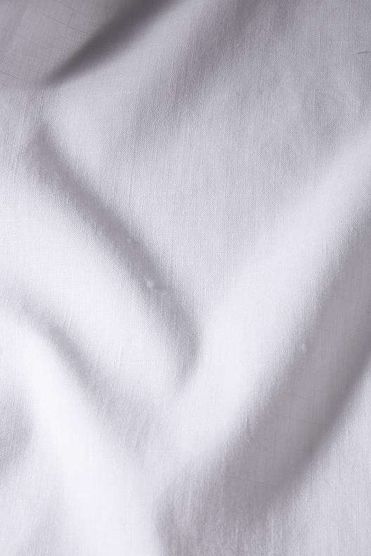 GRAVINA | Coll Ospiti del Mondo. Solid color piece dyed weft stretch fabric with plain weave structure.