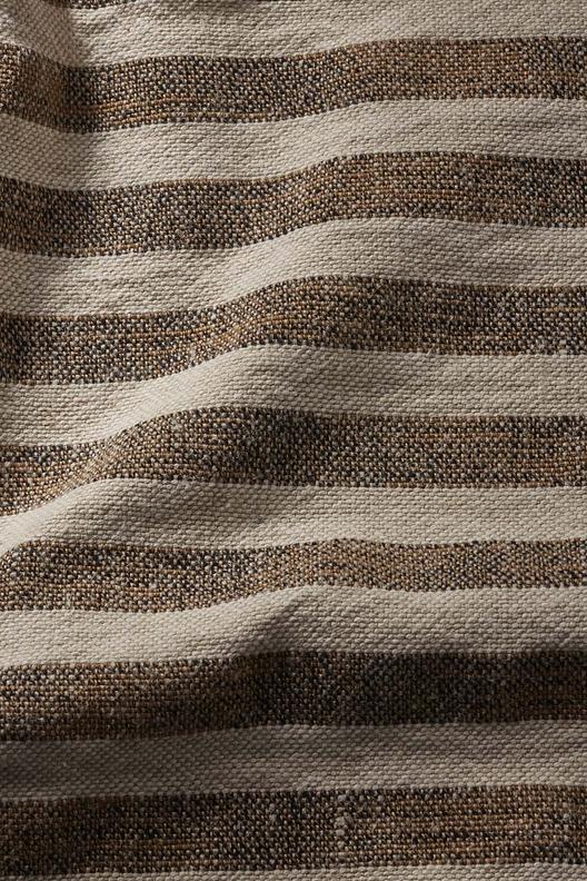 3079 p1 | Toile épaisse, rayure berbere, fils retors et moulinés, main solide. L'usine utilise 14% d'electricité autoproduite par panneaux solaires, et reutilise partiellement l'eau des ennoblissement pour le chauffage en periode froide. 
