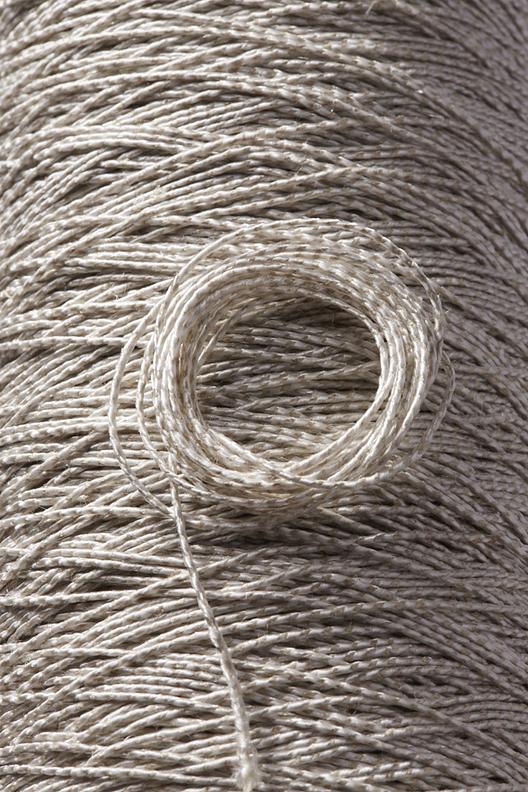 Thermo Stoppino Nm 1,8 Lino- P | Flax/polyester roving TEX 555 intended for thermoforming and thermocompression in thermoplastic composite parts manufacturing.