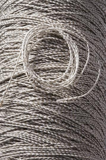 Thermo Stoppino Nm 2,9 Canapa-P | Thermo Stoppino Nm 2,9 Canapa-P – TEX 555 (66% hemp / 34% PES). Hemp/polyester roving TEX 555 compatible with weaving, thermoforming, and compression.