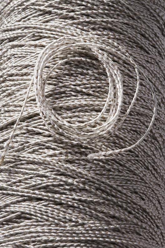 Thermo Stoppino Nm 2,9 Canapa-P | Thermo Stoppino Nm 2,9 Canapa-P – TEX 555 (66% hemp / 34% PES). Hemp/polyester roving TEX 555 compatible with weaving, thermoforming, and compression.