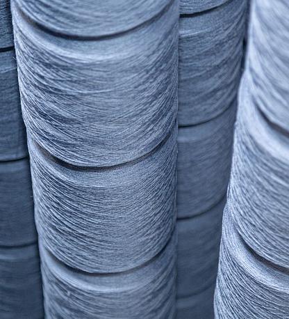 Spools of blue flax-linen thread